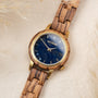 "Balos" watch featuring a Zebrawood case and Marble dial, offering a natural and elegant visual style.