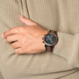 "Scattered" watch with marble and koa details, featuring a stylish and modern design.