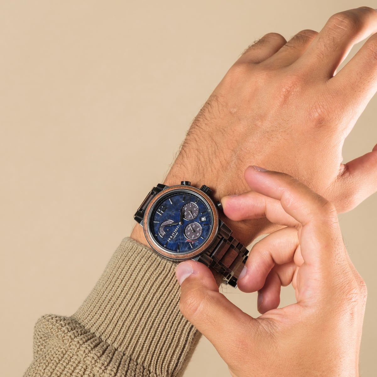 "Syntonize" watch featuring a sodalite dial and walnut accents in a stylish, sophisticated design.