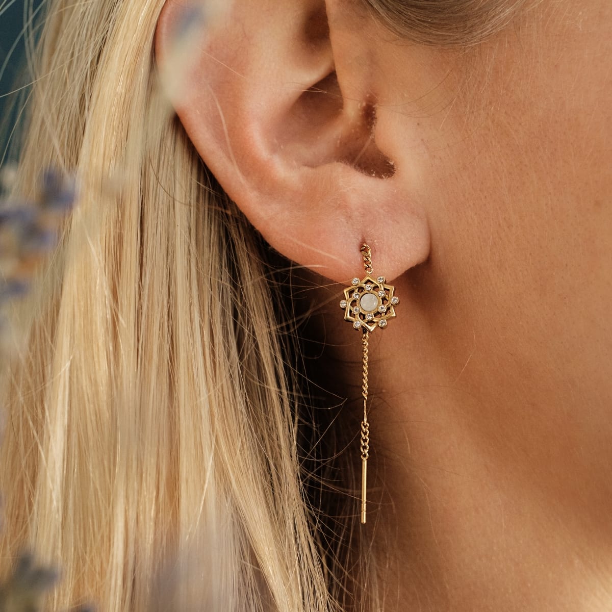"Composition Gem Earrings": Elegant gold earrings featuring moonstone and intricate design.