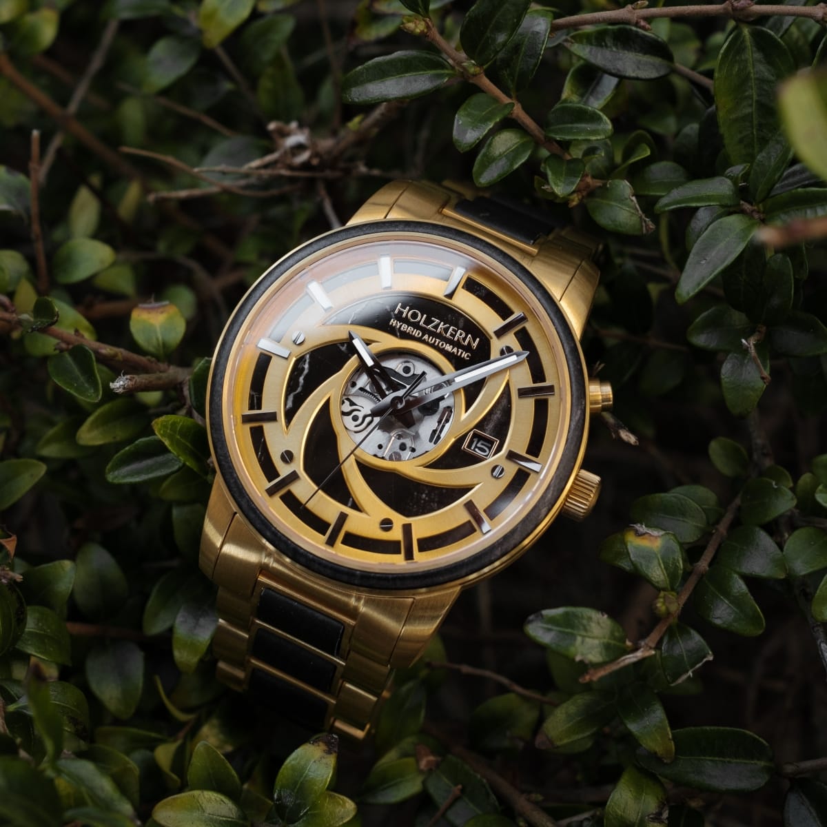 "Cyclonic" watch featuring a unique maple and marble design set in a sophisticated gold-tone exterior.