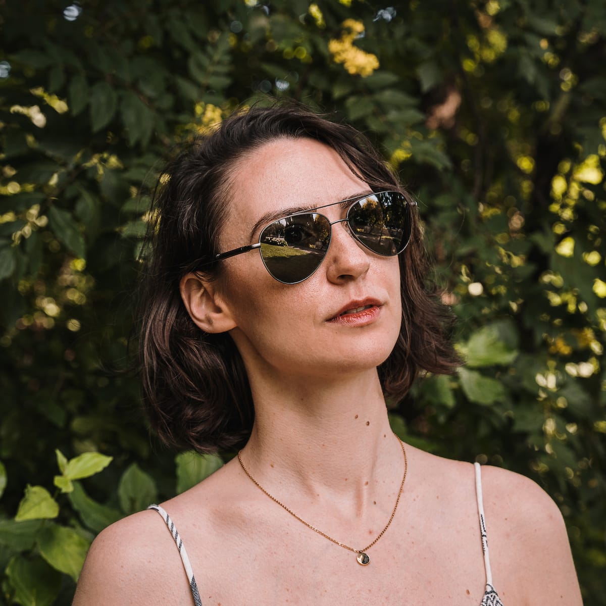 "The Badass II" sunglasses featuring a stylish Leadwood frame and Antique Silver accents.