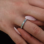 "Campania Ring" ring features a sleek silver band with nacre inlays, showcasing elegant and minimalist design.