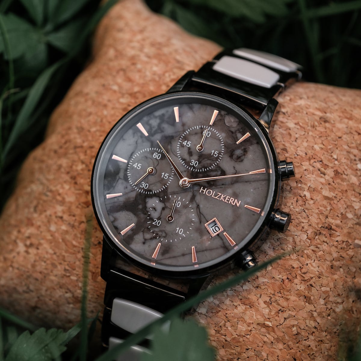 "Breezy watch with a marble-style ceramic face and sleek design."