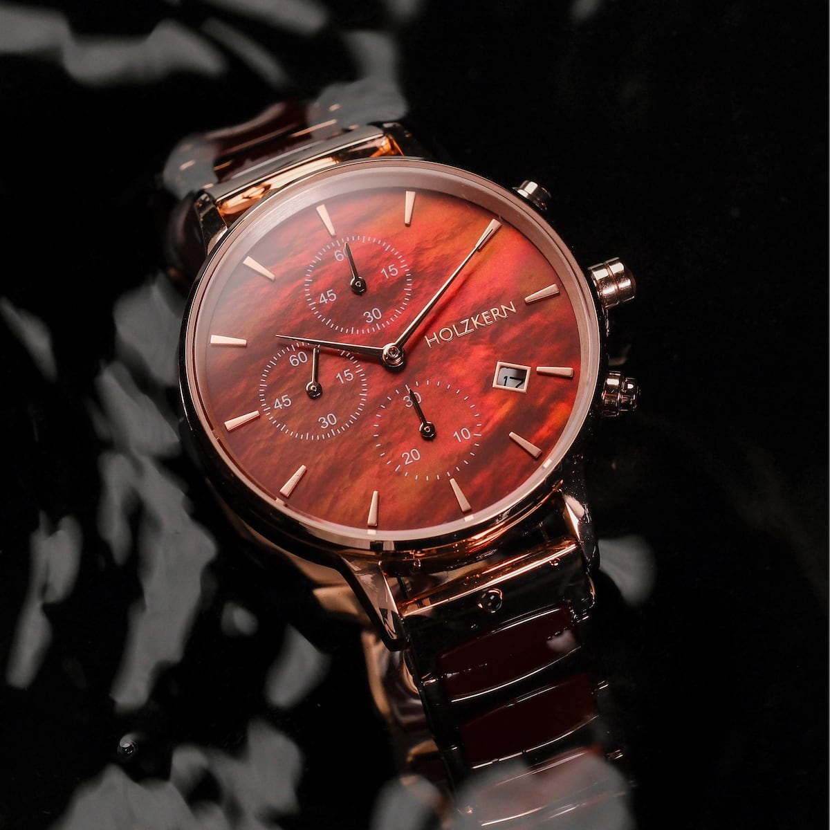 "Cheery" watch featuring a stylish red dial with a nacre and ceramic design.