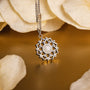"Composition Gem Necklace", a silver moonstone gem necklace with a delicate and intricate design.