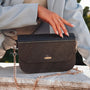 "Iveya VEGAN Black Slate vegan handbag featuring a sleek black slate design with a rose gold chain strap."