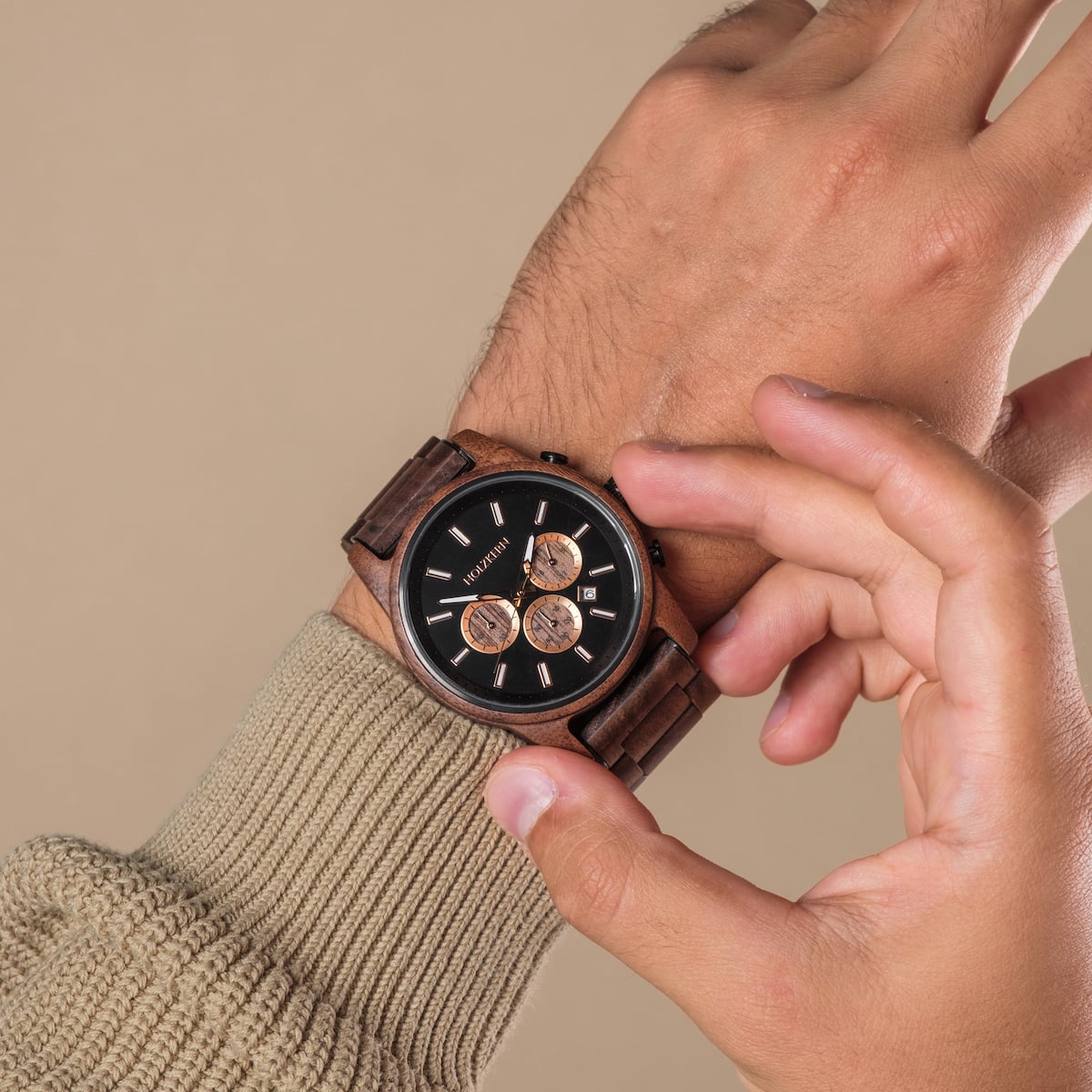 "Thicket" watch with walnut wood and marble accents, featuring a modern, stylish design.