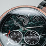 "Scattered" watch featuring a marble and koa wood style with detailed dials and a modern aesthetic.