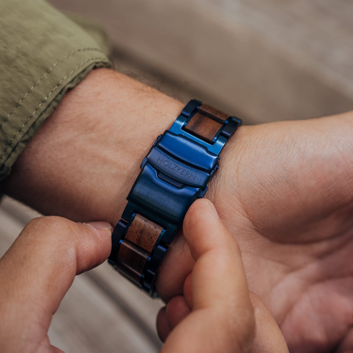 "Cobalt" watch with a walnut and blue design, highlighting its sleek, natural style.