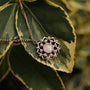 "Composition Gem Necklace" necklace, featuring moonstone and rose gold, in an elegant floral design.