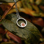 Collana "Pigment Collana" in Koa e argento con un design minimalista ed elegante.