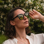 "The Exquisite sunglasses boast a stylish design with Leadwood frame and Khaki Dust lenses for a sophisticated look."