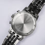 "The Observant watch featuring a sleek stainless steel case and bracelet, embodying a modern and sophisticated style."