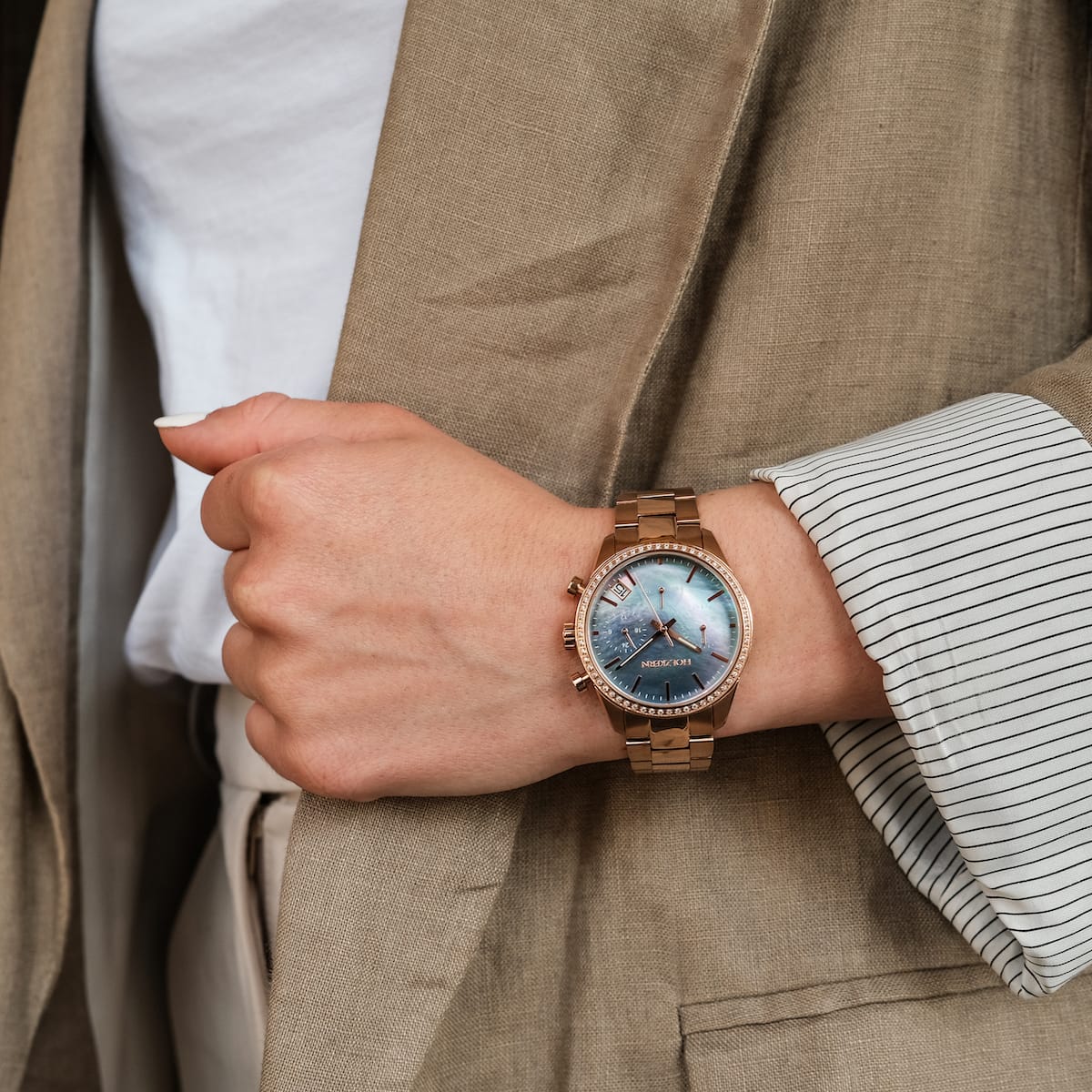 "The Passionate watch, featuring a nacre dial and rose gold accents, exudes elegance and style."