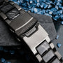 "Pacemaker watch with marble accents and sleek metallic design."