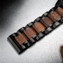 "Scattered" watch band featuring a marble and koa wood inlay with a sleek, modern design.