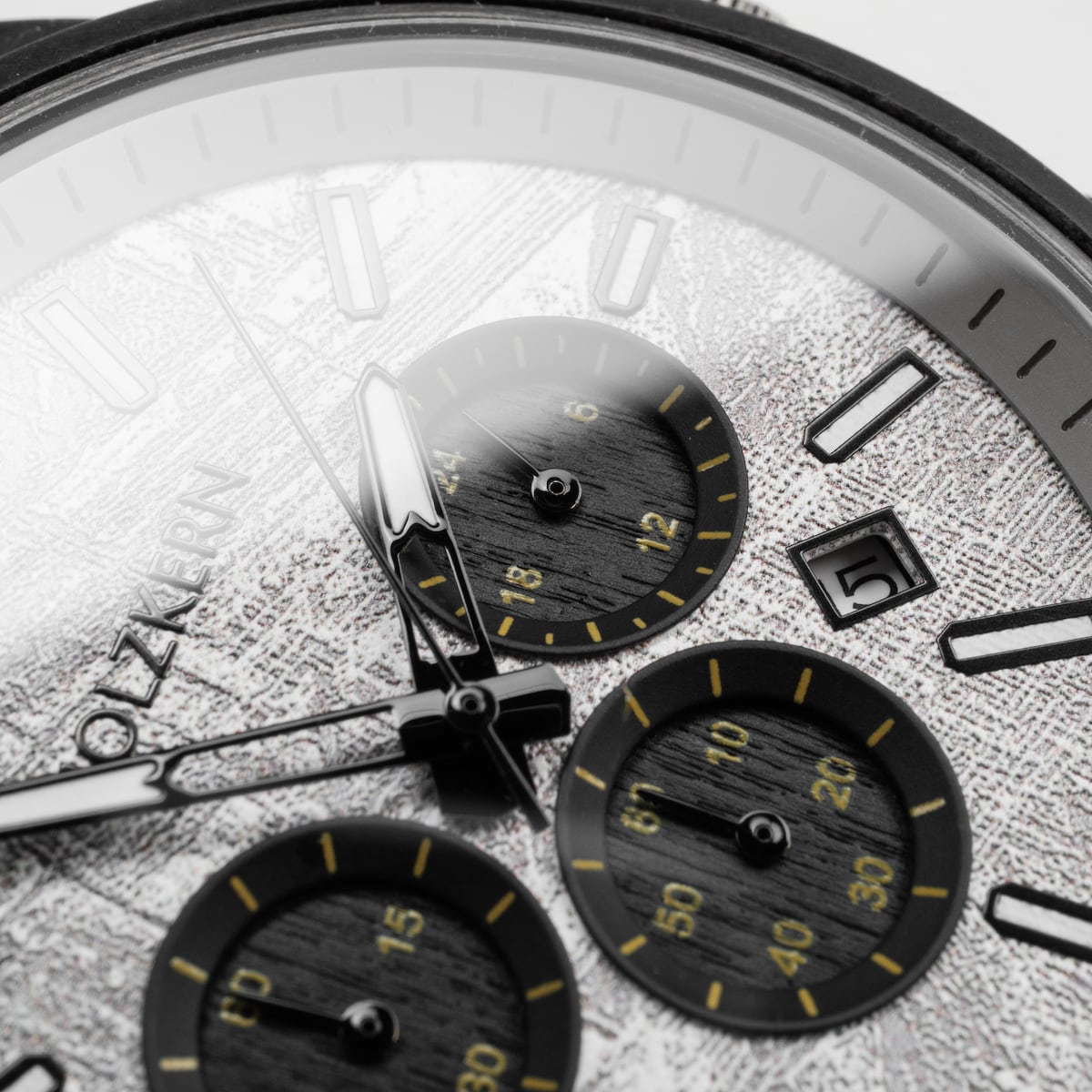 "Northwall" watch featuring a maple and rock grey design with a textured dial and subdials.