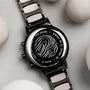 "Breezy watch featuring a marble and ceramic design with a sleek, modern style."