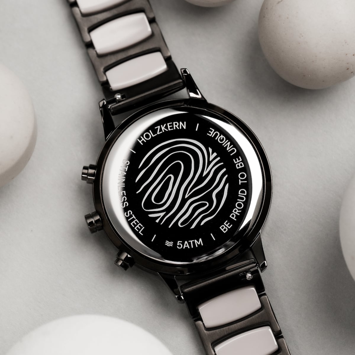 "Breezy watch featuring a marble and ceramic design with a sleek, modern style."