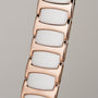 "Shiny" bracelet with ceramic and nacre, presenting a sleek and elegant design in rose gold tones.