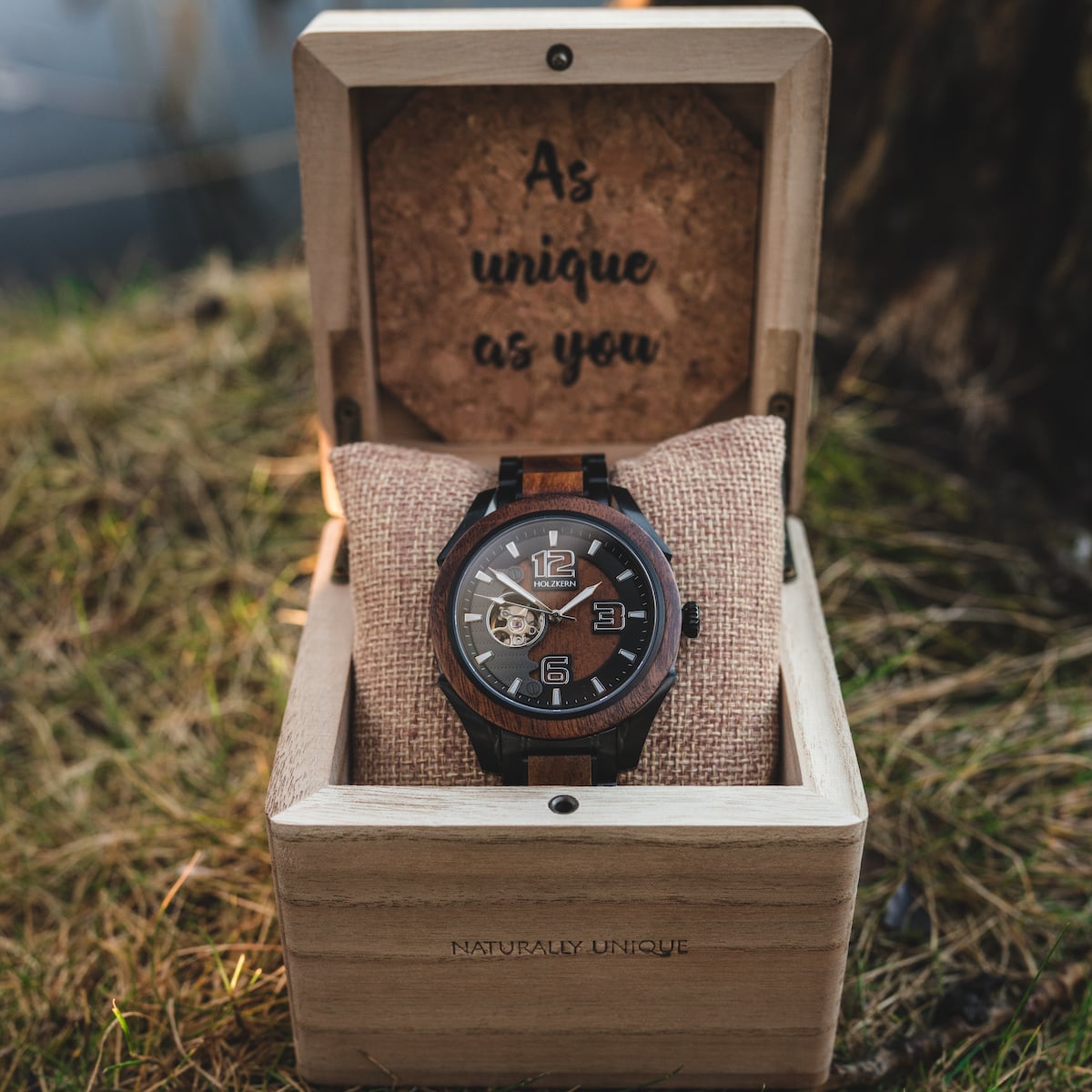 "Albert watch in Acacia with rustic design, presented in an open wooden box."