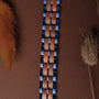 "Kanon" stylish bracelet featuring walnut and blue accents.