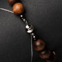 Collana "Superset" con perline di ematite e noce con un design elegante e moderno.