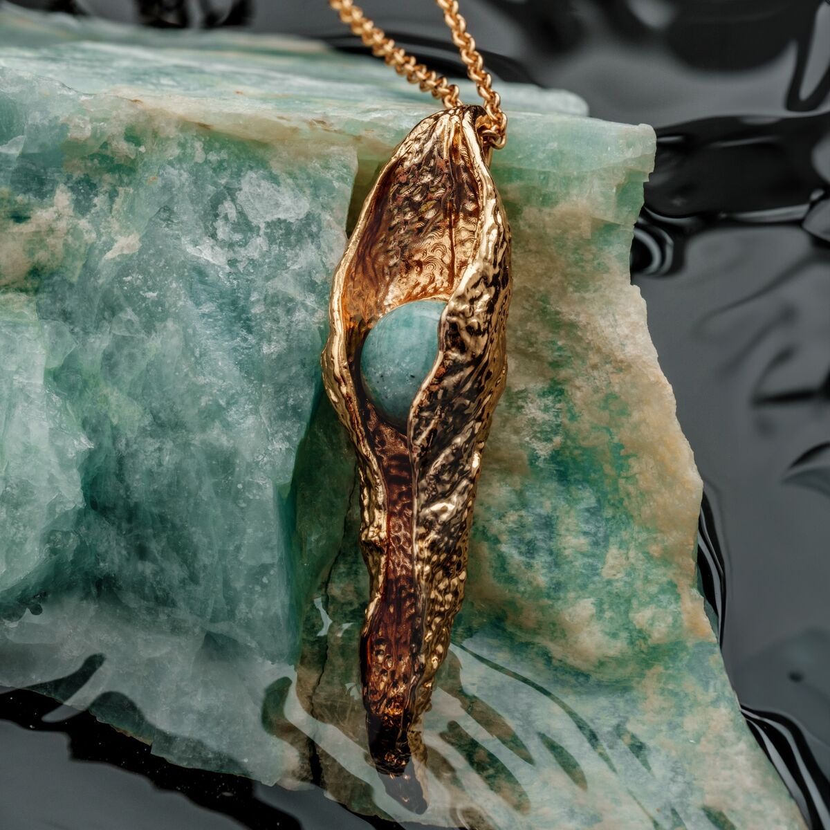 "Chalice Necklace" necklace, featuring Amazonite and gold accents in an elegant, artistic design.