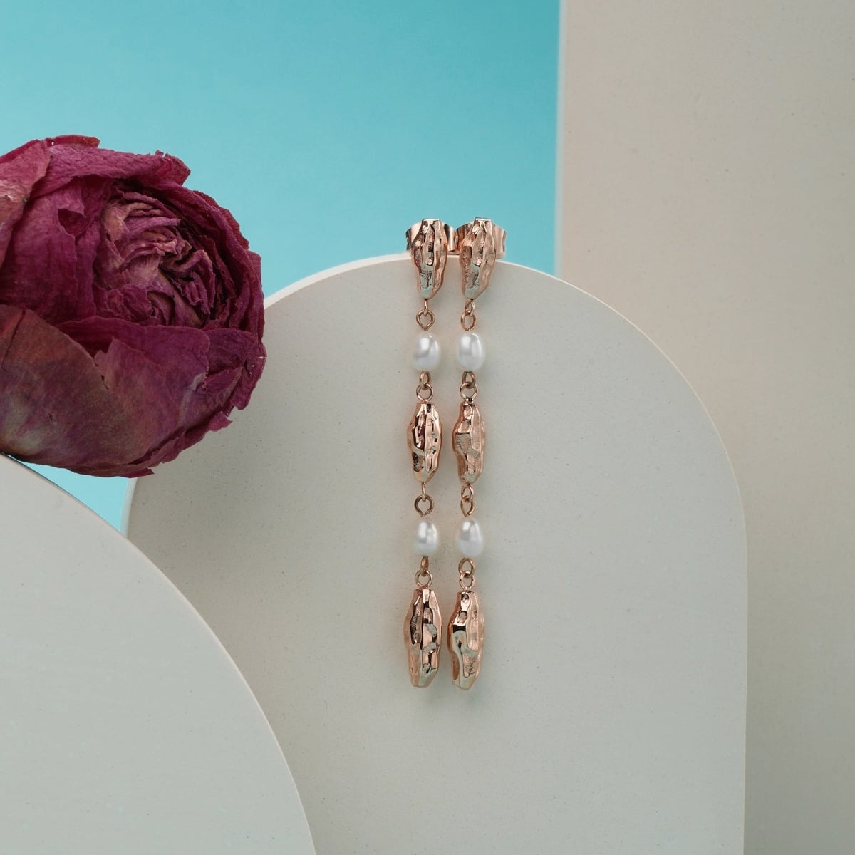 "Summersweet Earrings I: Elegant pearl and rose gold drop earrings with a delicate, modern design."