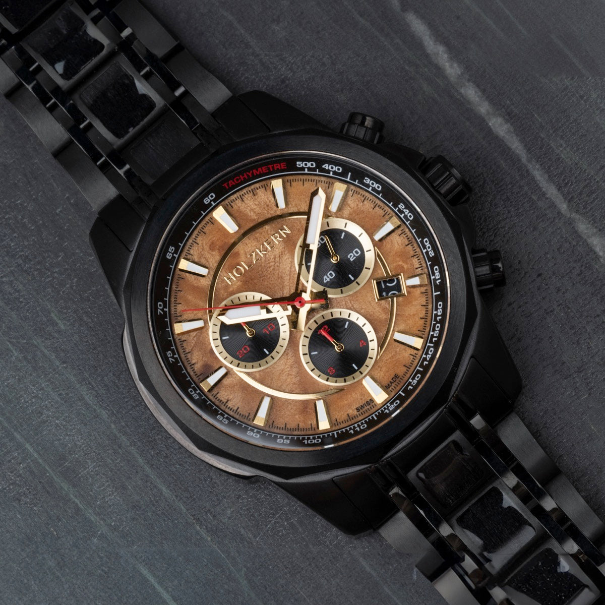 "Genevra watch featuring burl wood and maple accents, with a sophisticated and elegant design."