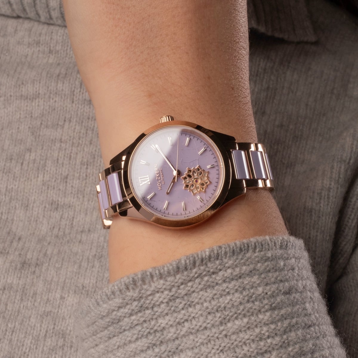 "Kaleidoscopic" watch with a ceramic band and amethyst style, featuring a kaleidoscopic design.