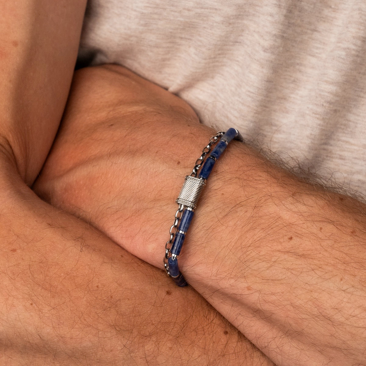 "Supersonic" bracelet featuring a sleek marble and silver design.