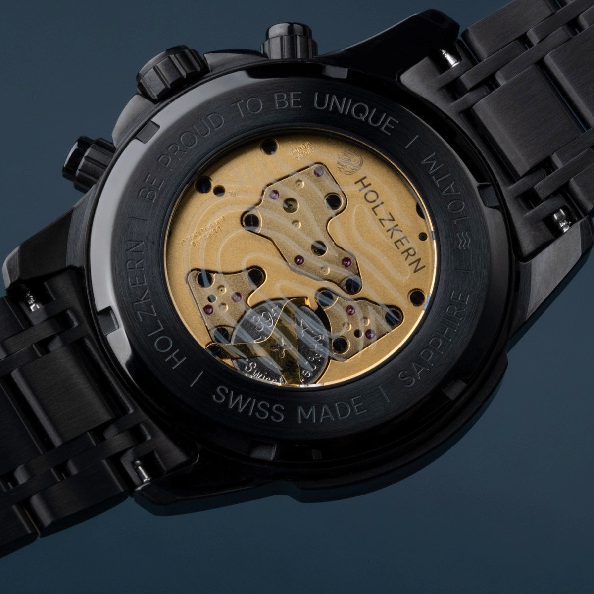 "Genevra watch featuring a burl wood and maple design with a unique exposed mechanism."