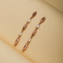 "Summersweet Earrings I, elegant earrings with pearls and rose gold for a sophisticated look."