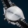 Orologio "Openhorizon" con un design grigio in marmo e argento con dettagli intricati.