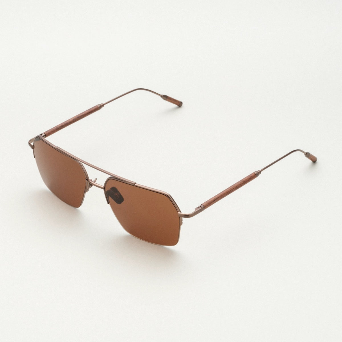 "The Visionary" sunglasses with a sleek walnut and bronze design.