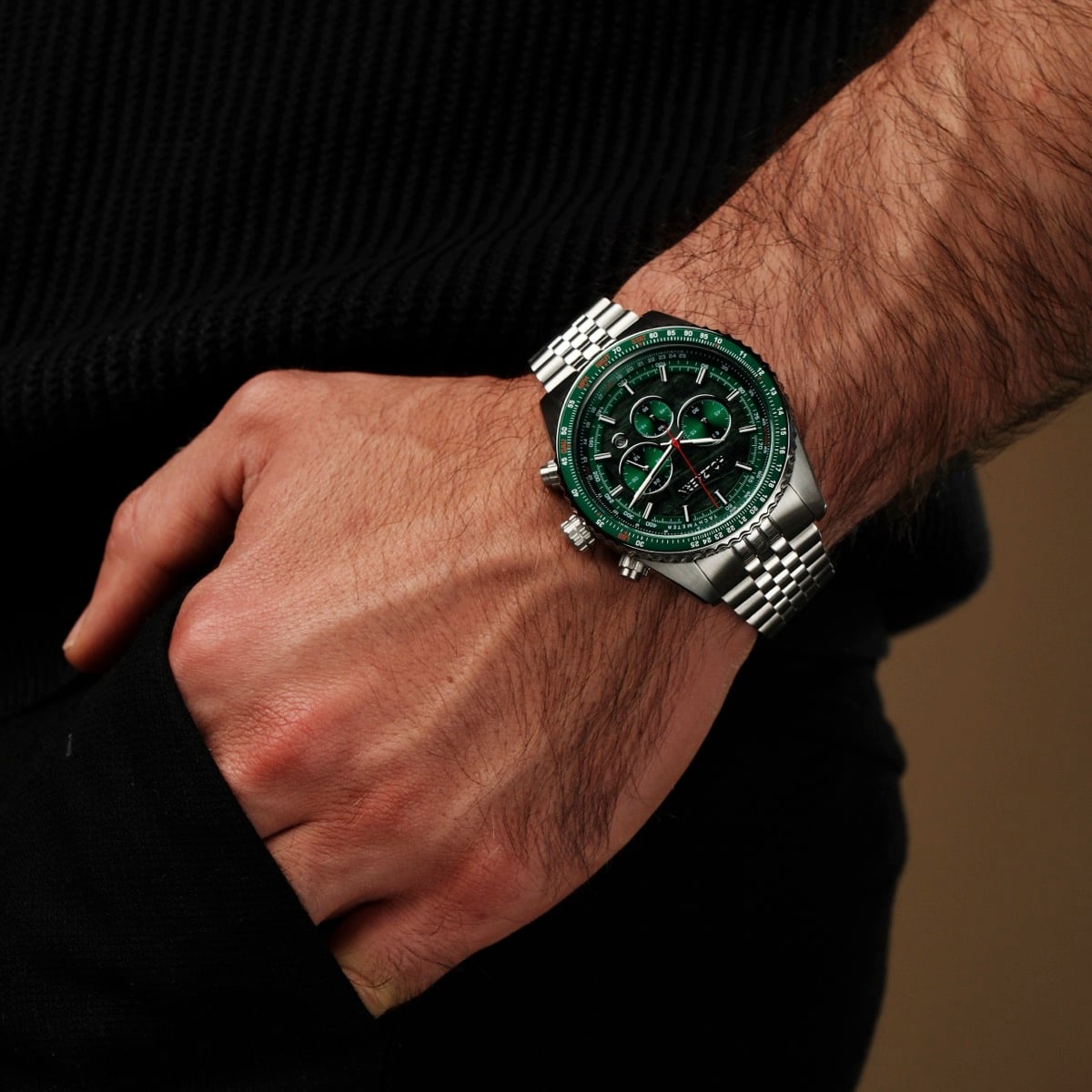 "Openhorizon" watch features a sleek green marble dial and silver bracelet, offering a sophisticated and elegant style.