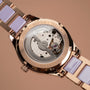 Orologio "Kaleidoscopic", che mostra intricati design meccanico e accenti ceramici ametista in un elegante, elegante disposizione.