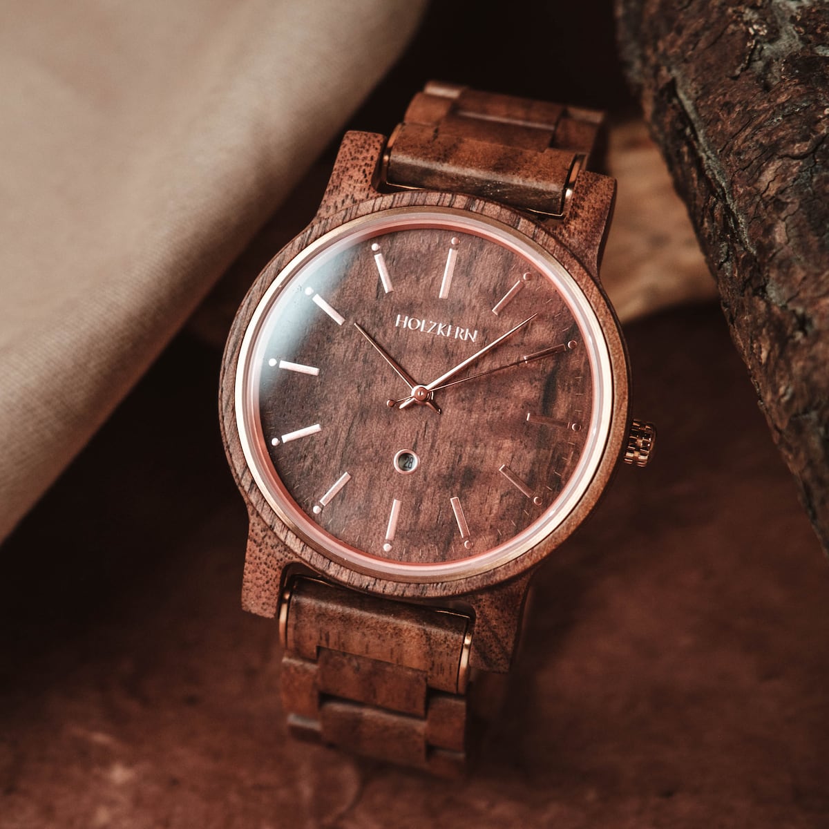 "Hesse" walnut watch, featuring a sleek design with a warm, natural finish.