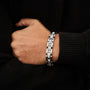 "Forte", a stylish bracelet in marble and silver, featuring a sleek chain design.
