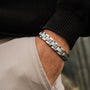 "Forte" bracelet featuring a sleek marble and silver design on a wrist.
