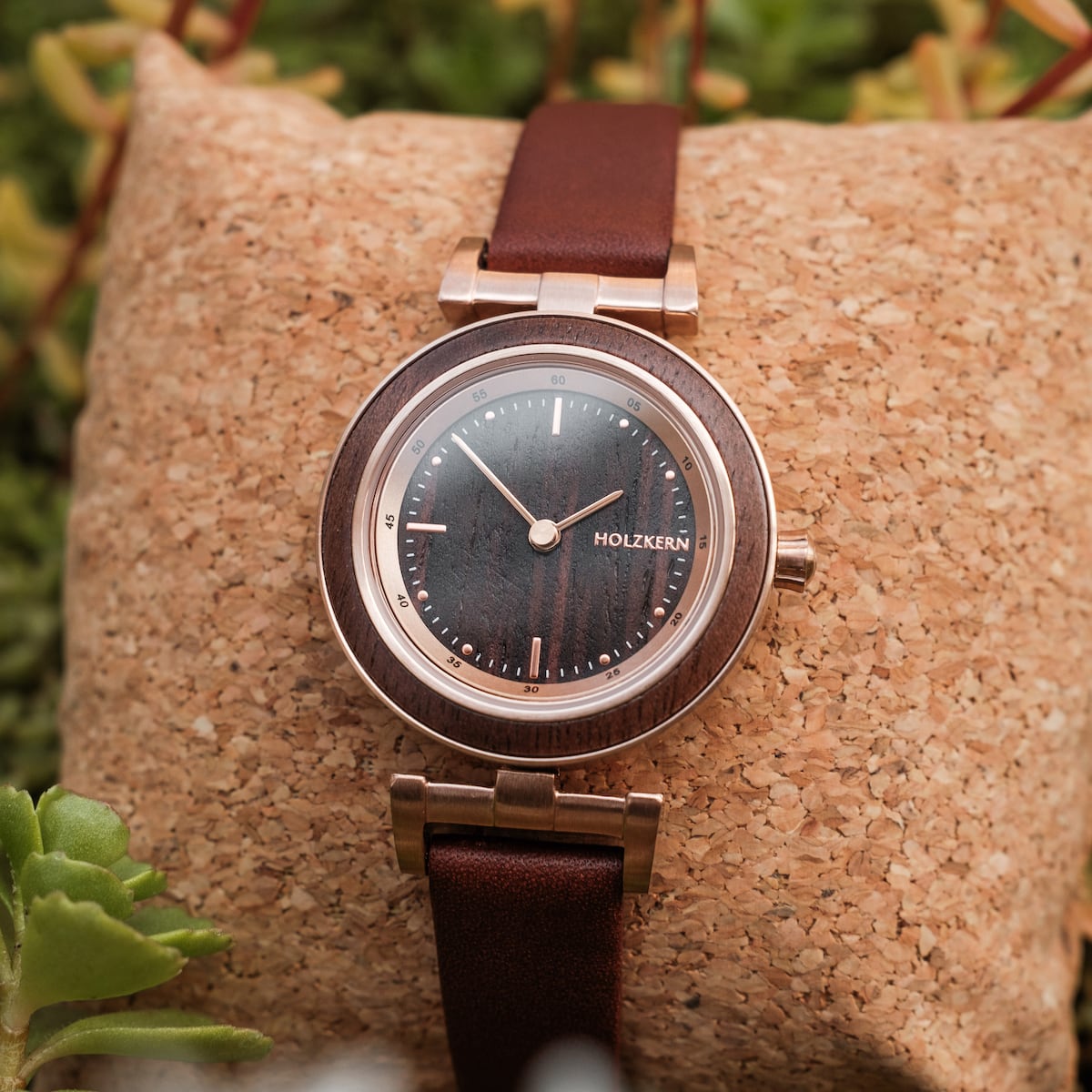 "Harriet" watch featuring walnut and maple design, elegant wooden dial, and a brown strap.