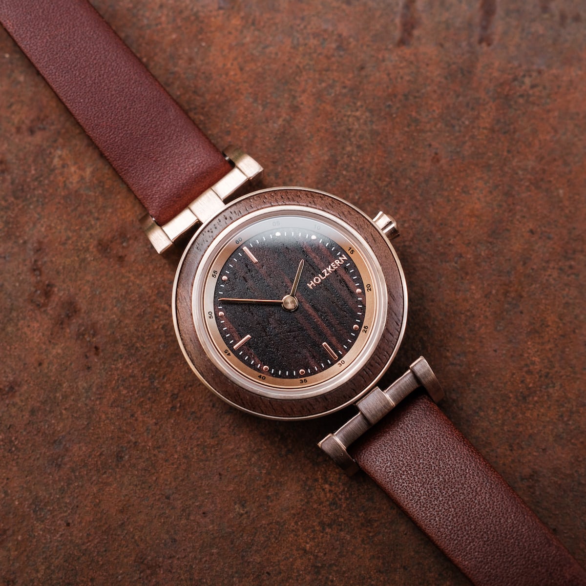 "Harriet", a stylish watch with a walnut and maple finish, featuring a leather strap for a classic look.